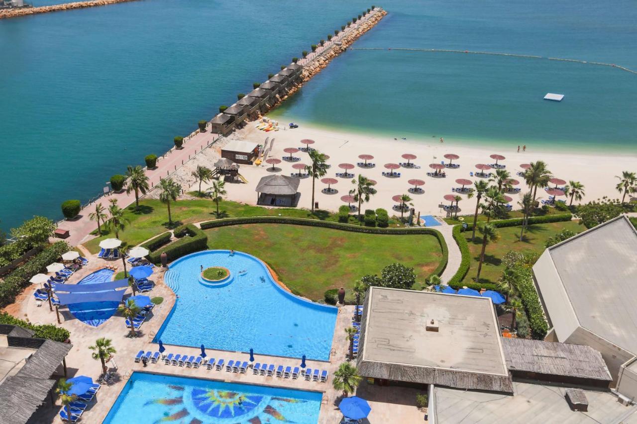 Radisson Blu Resort, Sharjah Exterior photo The beach at Jumeirah Beach Hotel